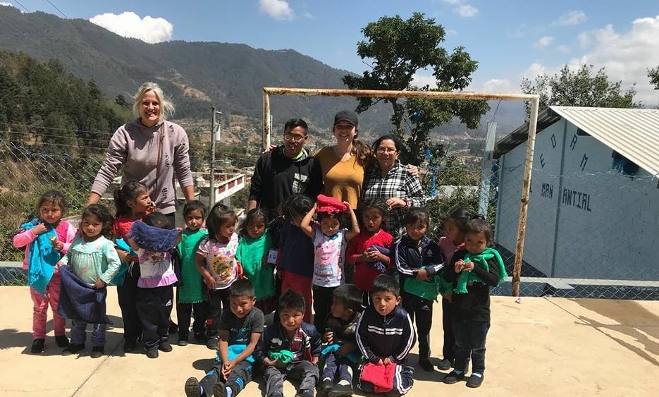 Volunteers with children